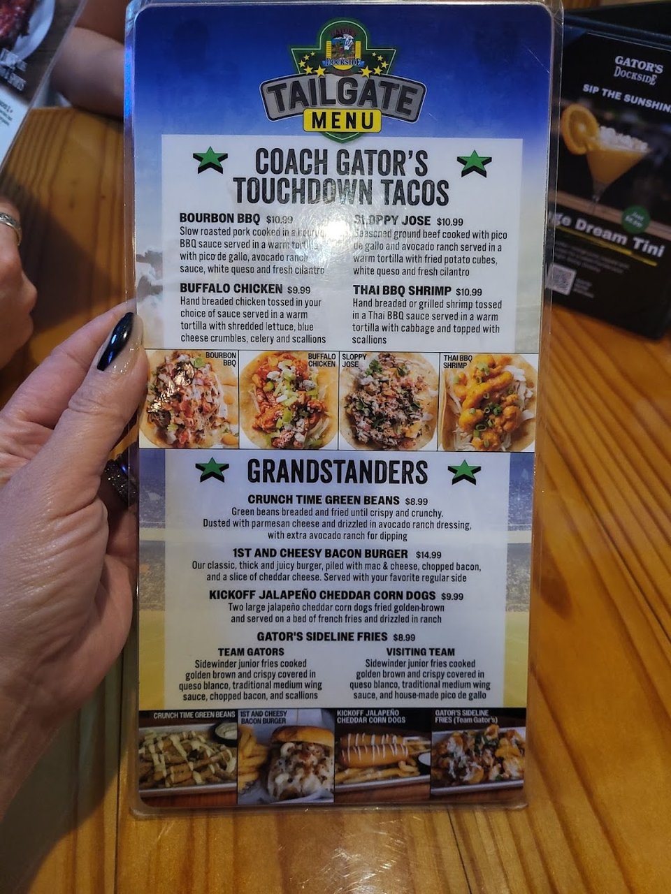 Printed menu with fried bites and small plates.